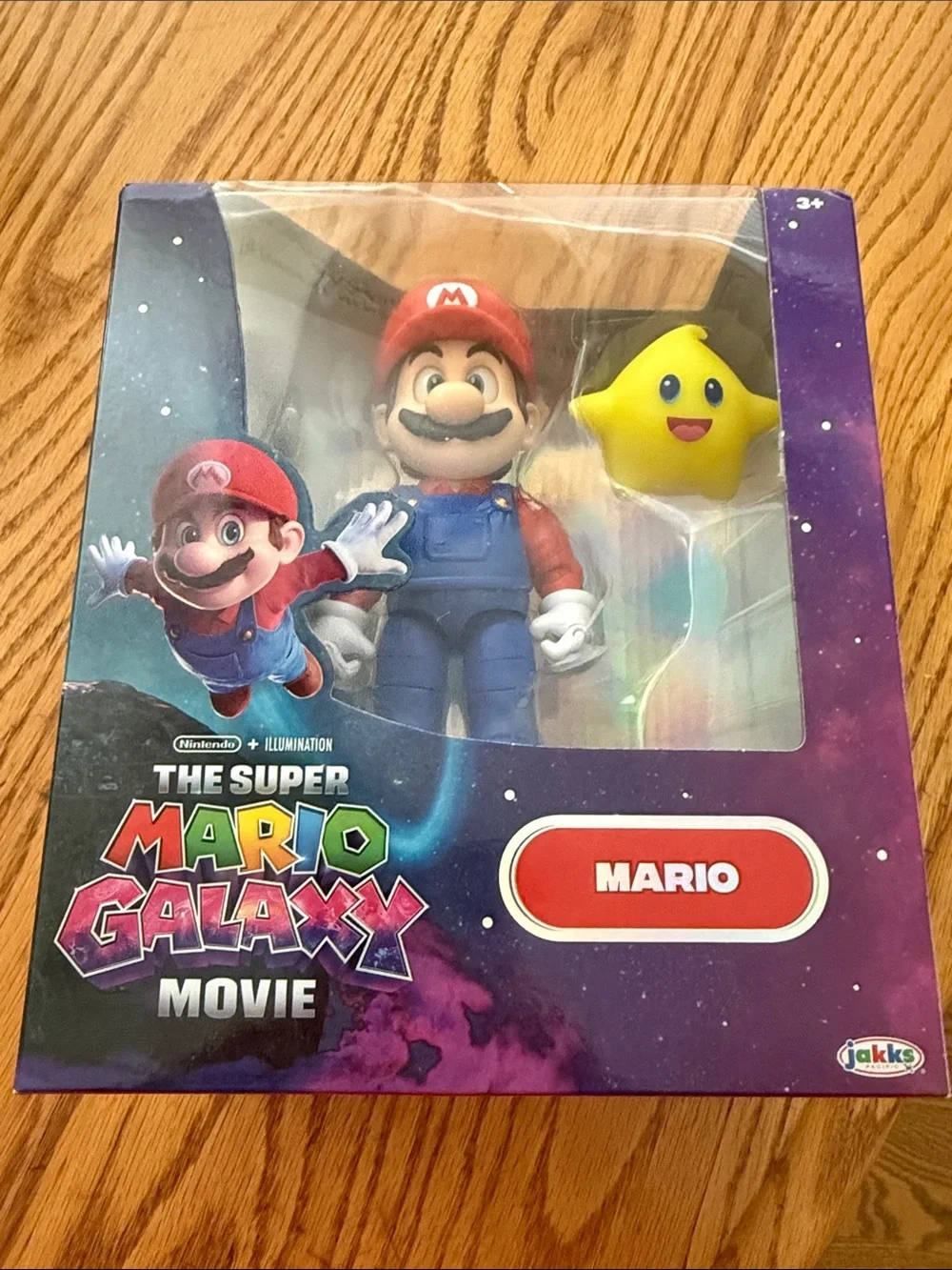 Nintendo Mario Figure with Red Hat, Blue Overalls and Yellow Luma